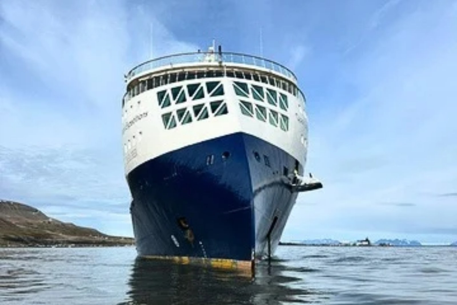 Quark Expeditions' Ocean Explorer, bow-on, in Svalbard.