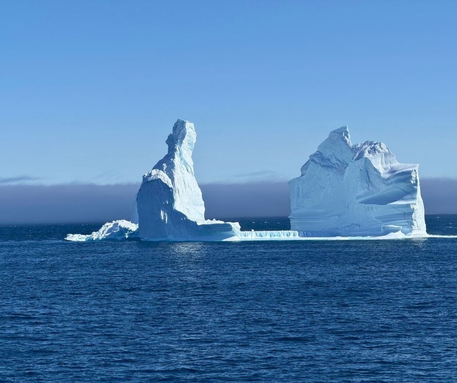 A large blue iceberg in East Greenland seen from National Geographic Resolution.